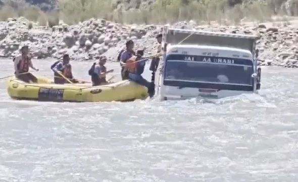 Two-people-rescued-from-river-1775828323415_v